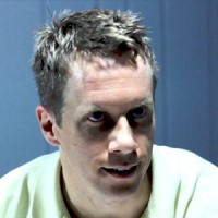 Rick Hughes Man with close-cropped dark hair